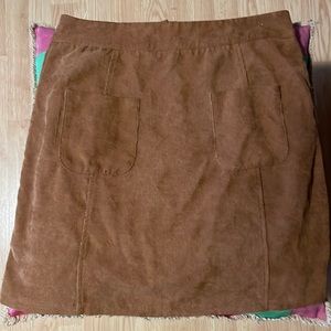 Brown corduroy miniskirt with front pockets